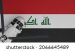3D Rendering of a top down view of a White Helicopter in the Bottom Left Corner and on top of the National Flag of Iraq