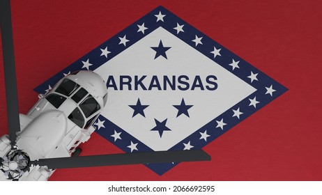 3D Rendering of a top down view of a White Helicopter in the Bottom Left Corner and on top of the US State Flag of Arkansas