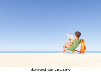 3D rendering of unrecognizable ethnic female traveler with Afro hair reading interesting book sitting on deckchair on sandy beach at seafront against cloudless blue sky - Powered by Shutterstock