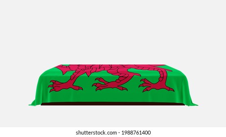 3D Rendering Of A White Background Casket Drapped With The Flag Of Wales