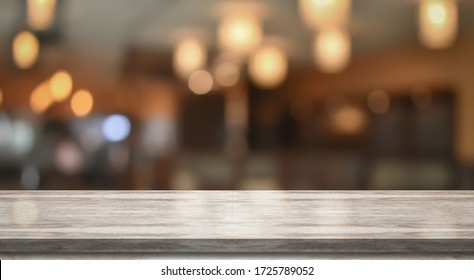 3D Rendering, Wooden top table with bokeh light effect and blur restaurant on background, blur background - Powered by Shutterstock