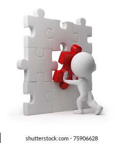 3d small person inserting last part of a puzzle. 3d image. Isolated white background.