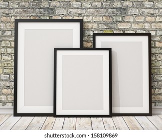 3d Of Three Blank Black Picture Frames On The Old Brick Wall And The Wooden Floor, Background