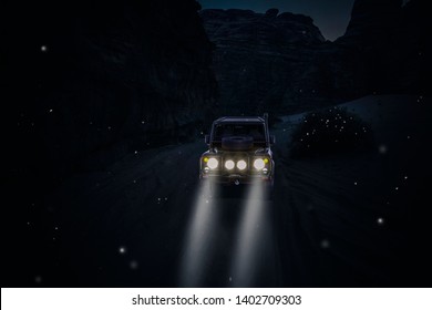 4x4 Car In The Desert With Lights On In The Night And Flying Fireflies. Travel And Adventure Concept.