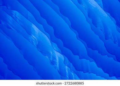 8K blue wavy pattern abstract background. Generic background for all purposes. Vibrant colours cinematic style.