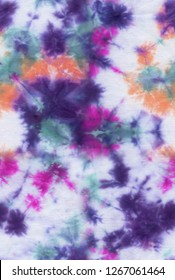 Absctract seamless tie  dye hand painted fabriс background and irregular floral spots