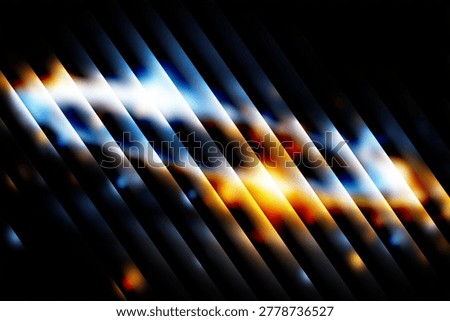 Abstract background with diagonal lines of light and blurred bokeh effects in warm and cool tones against a dark backdrop.
