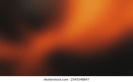 Abstract background featuring a blurry gradient of orange and black colors with a grainy texture