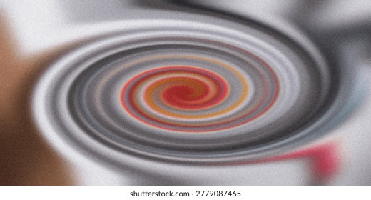 An abstract background featuring a hypnotic swirling spiral effect with vibrant red and orange center tones transitioning into soft grey and white textures.