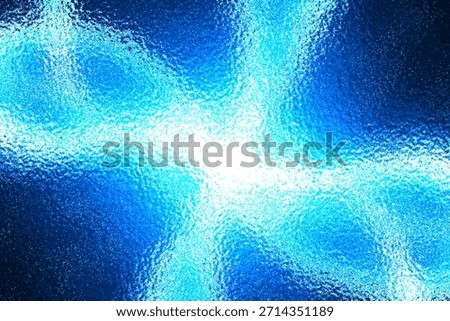 An abstract background featuring a rough, textured surface resembling frosted glass or rippled water A bright white light source radiates from the center, creating a vibrant gradient effect with