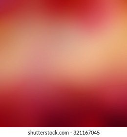 abstract background in gold and red hues. autumn background. Thanksgiving background in warm brown gold red and orange colors with smooth blurred texture.