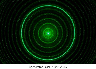 Abstract background with green plasmatic circle effect. Dartboard.