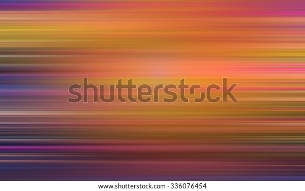 Abstract background image is blurred. Colorful\
background. Blurring background. Blurred light. Variety of color.\
Background for motivational text. Motion blur. Autumn color - red,\
orange, yellow.