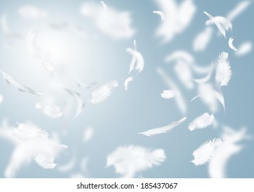 Abstract background image of white feathers flying in air