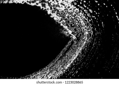 Abstract background. Monochrome texture. Image includes a effect the black and white tones.