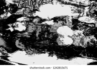 Abstract background. Monochrome texture. Image includes a effect the black and white tones.