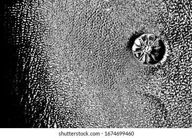 Abstract background. Monochrome texture. Image includes a effect the black and white tones.