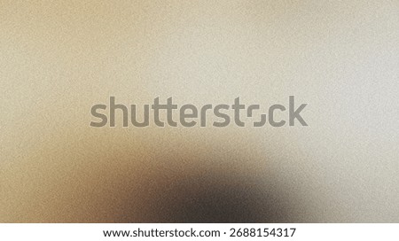 Abstract beige background presenting a subtle grain texture, showing a soft light gradient transitioning to shadow and noise