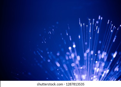 Abstract blue internet background with optical fiber light
