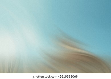 Abstract blurred background featuring a blend of blue beige and white tones creating a soft effect