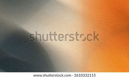 Abstract blurred background featuring a blend of orange gray and beige tones creating a soft gradient effect