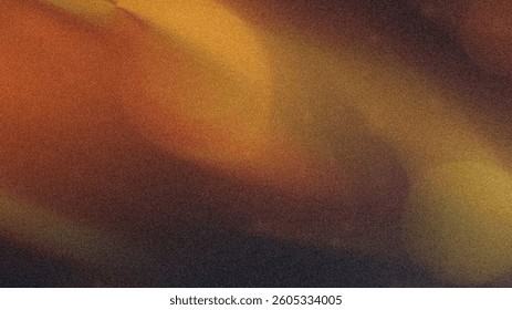 Abstract blurred background featuring warm tones of orange yellow and brown creating a soft dreamy effect