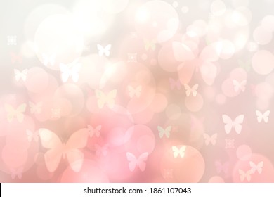Abstract blurred vivid summer light delicate bright pink yellow bokeh background texture with bright soft color flowers and butterflies. Hello spring card concept. Beautiful backdrop illustration.