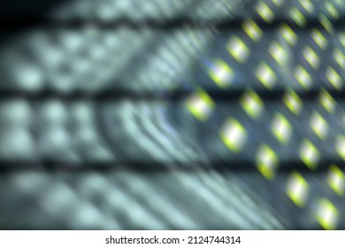 Abstract brown background, white light shines through beautiful bright clear glass.