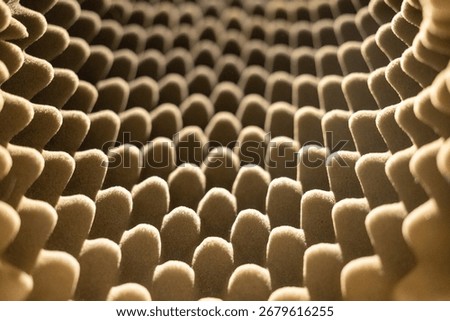Abstract closeup of egg crate style acoustic foam texture. Noise reduction surface used in sound studios and home theaters for echo control and insulation