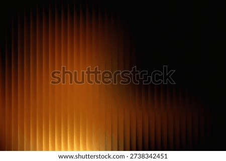 Abstract composition featuring warm orange gradients fading into deep shadows with soft vertical blur stripes and subtle grain texture. Smooth transitions create a cinematic and atmospheric feel suitable for digital wallpapers, website headers, branding materials, posters, and modern presentation designs. The layout offers a dynamic yet minimal backdrop ideal for creative and professional visual projects.