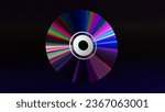 Abstract concept. CD DVD disc on a black isolated background. Neon blue purple color. Rainbow. 3d illustration.