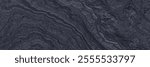 Abstract cooled volcanic lava background. Black basaltic rock surface