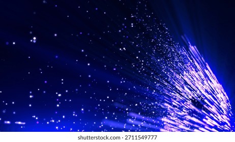 An abstract design featuring dynamic blue light streaks and shimmering sparkles against a dark background. the effect is both captivating and energetic, conveying a sense of movement and vibrancy