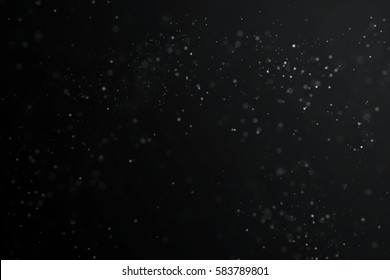 Abstract Dust Particle Background with Light Leak. Narrow Depth of Field.