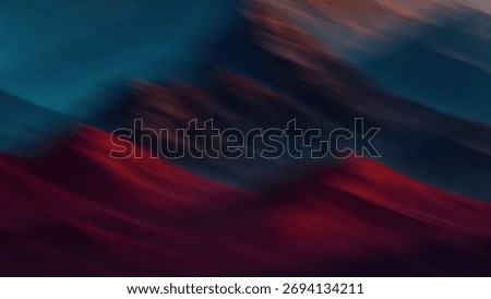 An abstract, dynamic blend of deep reds, dark blues, and hints of orange across diagonal streaks. It evokes a feeling of blurred motion or dramatic, stylized mountains.