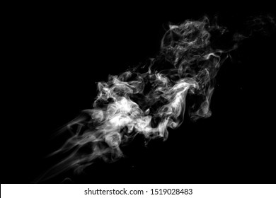 Abstract flowing wisps of smoke isolated on black background. Design element 