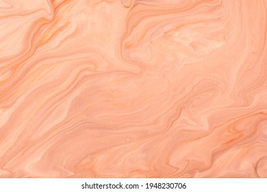 Abstract fluid art background light coral colors. Liquid marble. Acrylic painting on canvas with peach gradient and splash. Watercolor backdrop with wavy pattern. Stone section.