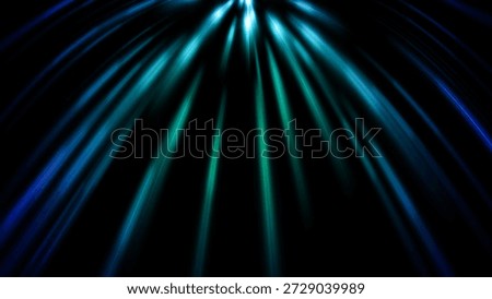 Abstract glowing blue light rays falling on black background