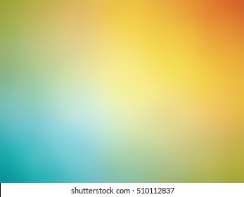 Abstract gradient rainbow orange yellow teal colored blurred background 