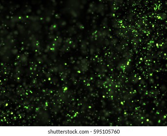 Abstract Green Glitter Explosion On Black Background