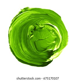 Abstract hand painted acrylic circle texture in green color. Round design element isolated on white background. Detail or closeup brush stroke pattern.
