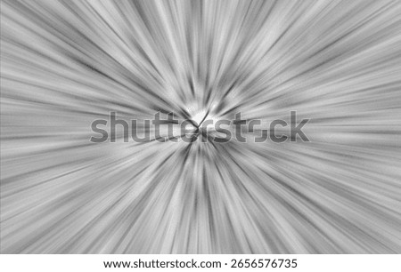 abstract image featuring a central point of light and blurred, radiating lines creating a zoom or vortex effect.  The dark background is textured, suggesting depth and movement.