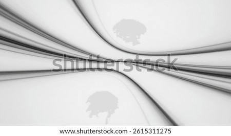 Abstract intersecting curved lines create a bold focal point, ideal for tech branding, product showcases, or creative minimalist artwork