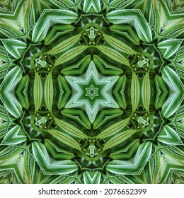 Abstract kaleidoscope background. Beautiful kaleidoscope seamless pattern. Green color theme mosaic texture. Seamless kaleidoscope texture. Unique kaleidoscope design.