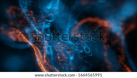 Abstract Macro slow motion shot of Blue and Orange Particle Fluid isolated on black. paint drops mixing in water. Ink swirling underwater. Colored cloud abstract smoke explosion animation. 3D render
