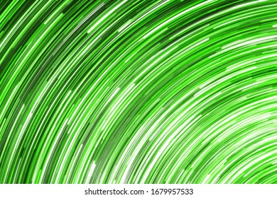 Abstract round circle background. Retro vinyl disco backdrop. Rotate graphic design. Spinning neon lights texture. Green disc pattern. Led glowing lines.