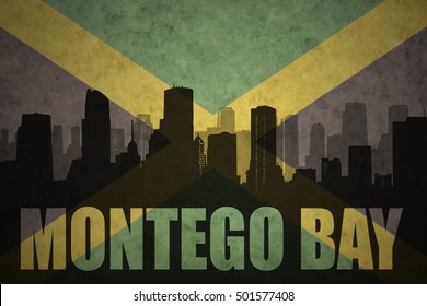 Abstract Silhouette Of The City With Text Montego Bay At The Vintage Jamaican Flag Background