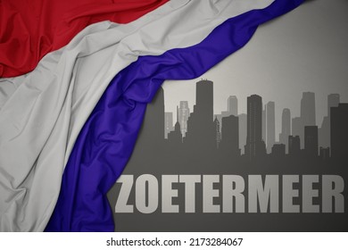 abstract silhouette of the city with text Zoetermeer near waving colorful national flag of netherlands on a gray background.