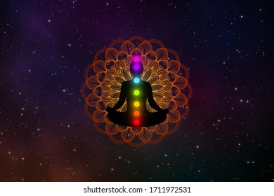 Abstract silhouette meditation man with seven chakras  and precious mandala in the galaxy.