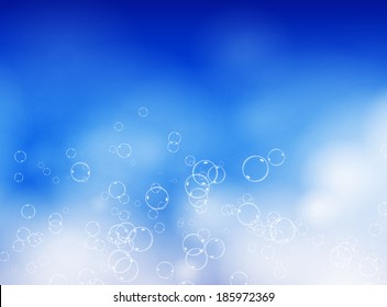 Abstract Soap Bubble On Blue Background.